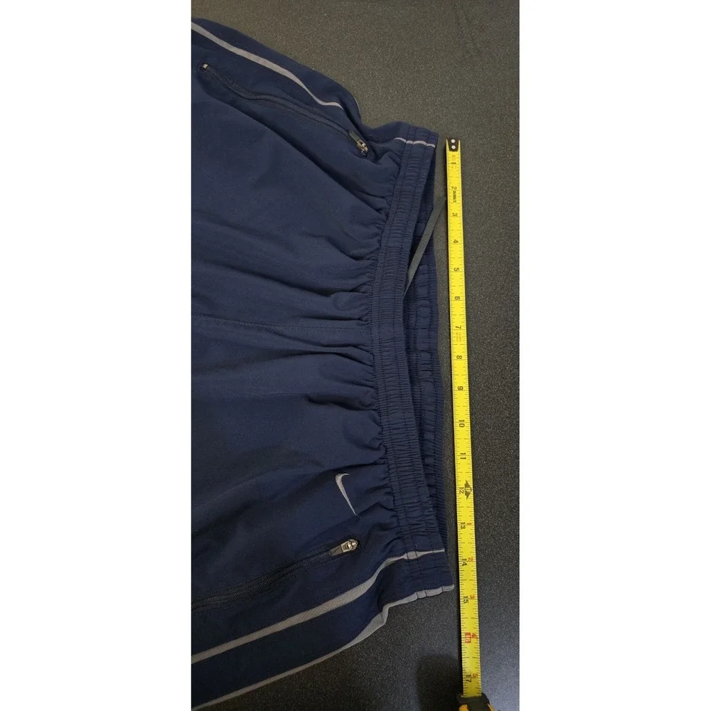 Vintage 90's Nike Nylon Blue Track Pants‎ Sweatpants Men XL Swoosh Zip Ankle